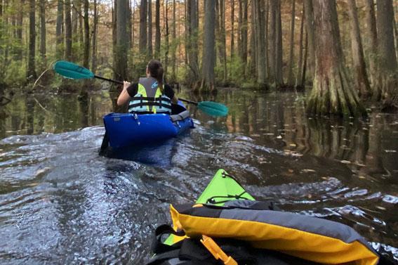 students kayaking