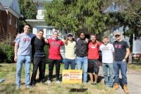 Fraternity students group photo during volunteer work