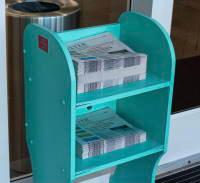 Newspaper stack plastic holder