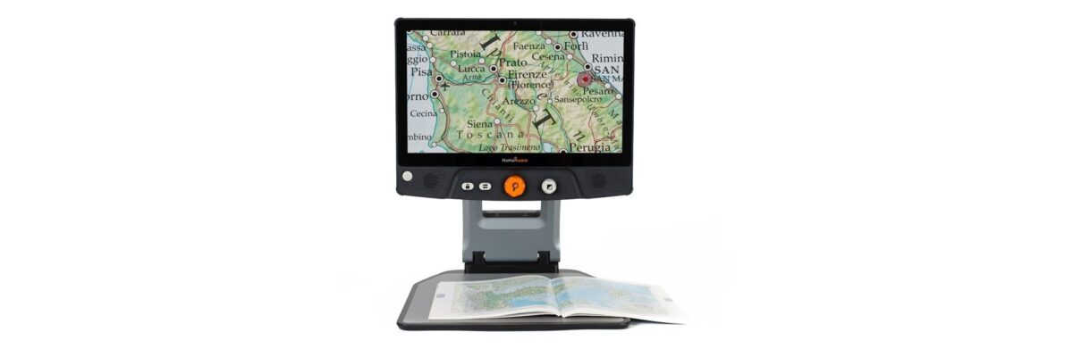 Reveal 16 Portable Desktop magnifier on with a map on the table and magnified on the screen