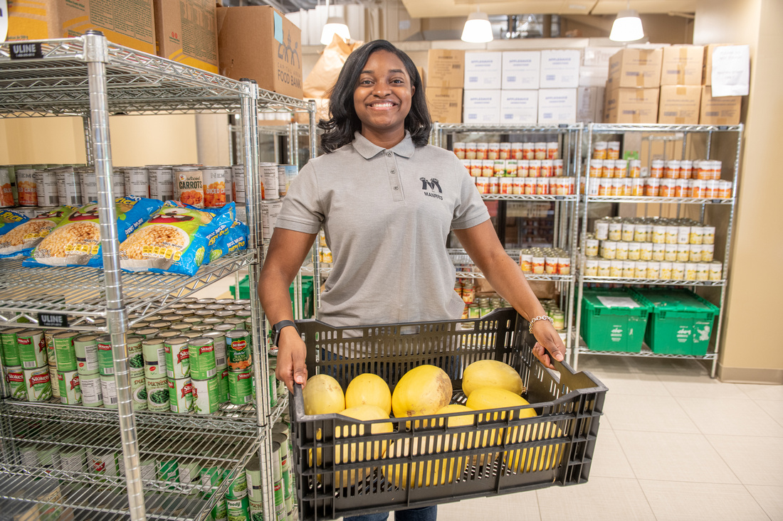 Agricultural & Resource Economics student in pantry