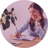 woman-writing-and-smiling