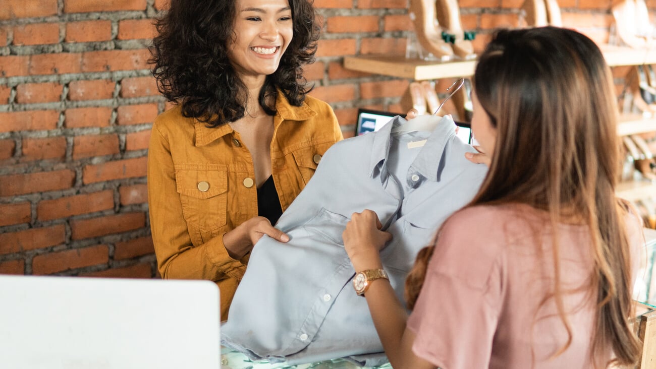 shopping customer returning product to the seller; Shutterstock ID 1709614225