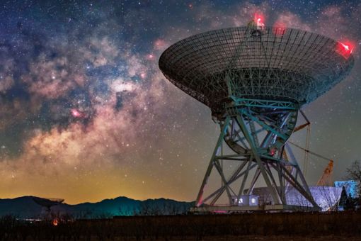 Large antenna against a starry background