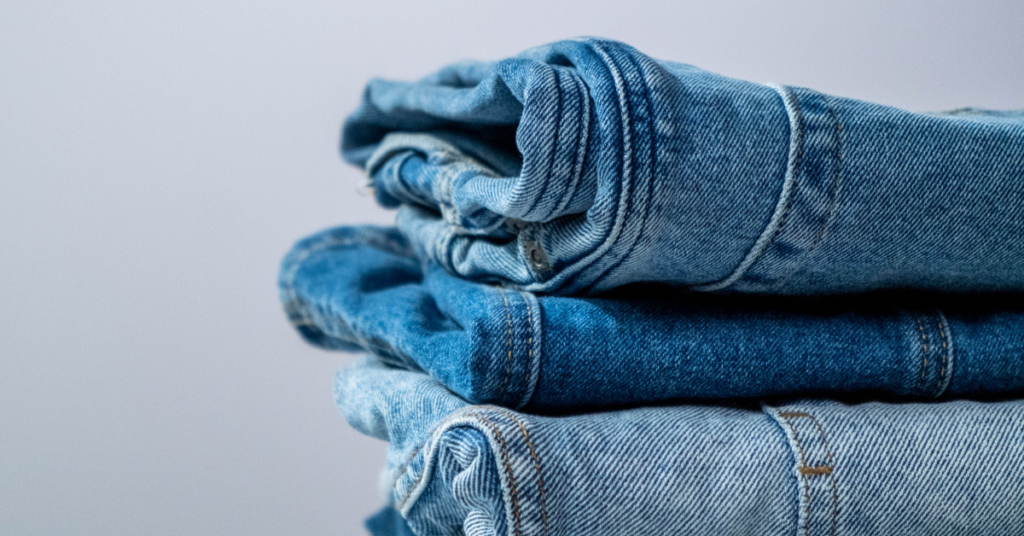 Stack of denim jeans