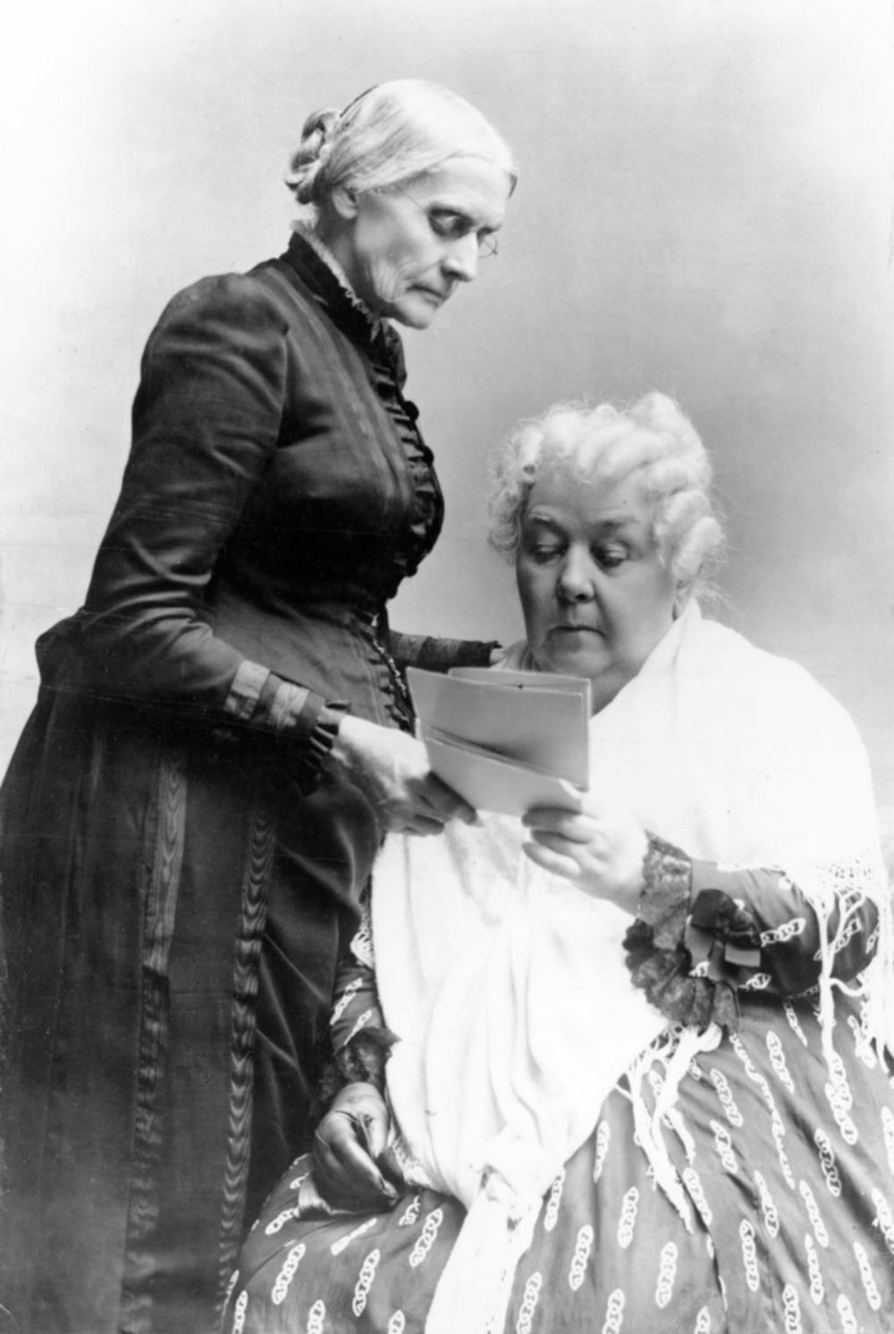 Elizabeth Cady Stanton (seated) and Susan B. Anthony.