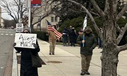 Protestors outside of the Office of Personnel Management in Washington, D.C., on Sunday. 