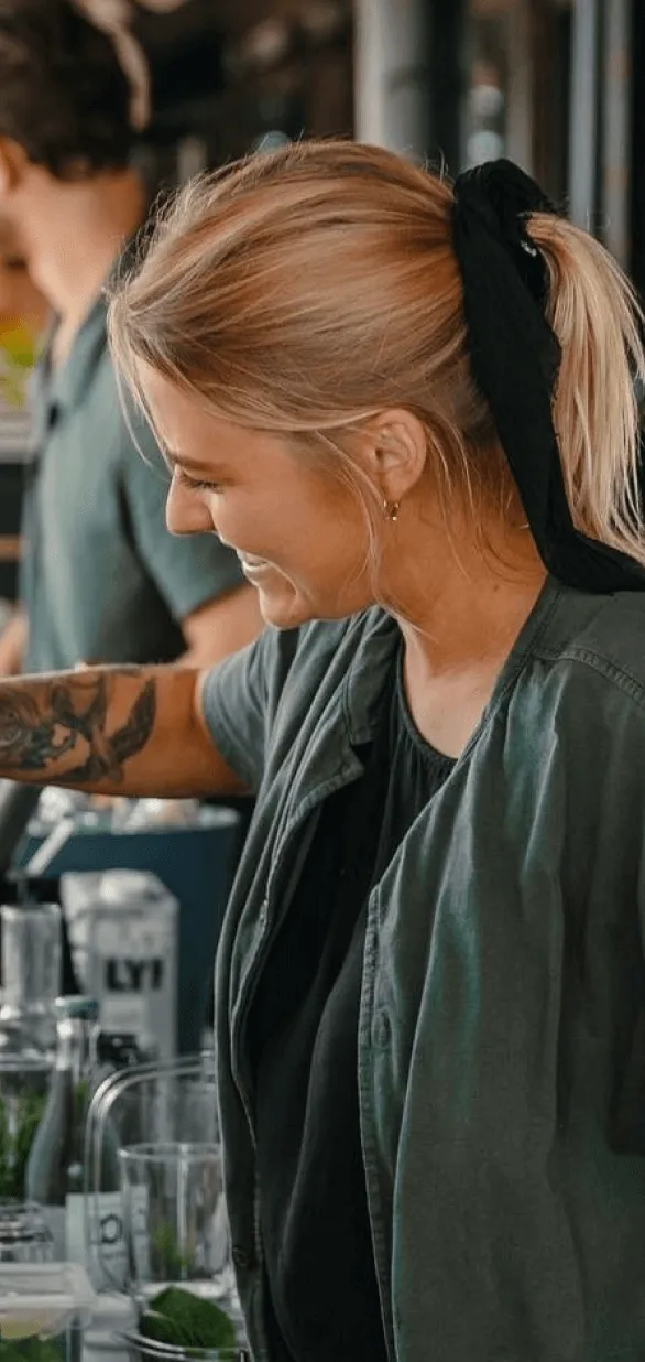 Picture of a bartender mixing a drink. Mister French