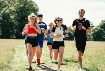 People running at the field.