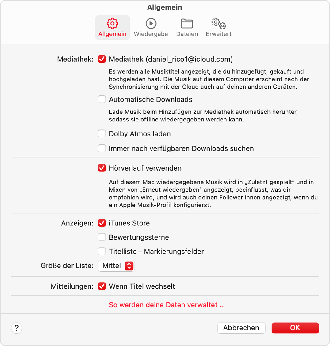 Der Tab „Allgemein“ der Apple Music-Einstellungen. Der dritte Abschnitt enthält die Optionen „Anzeigen“, und „iTunes Store“ ist ausgewählt.