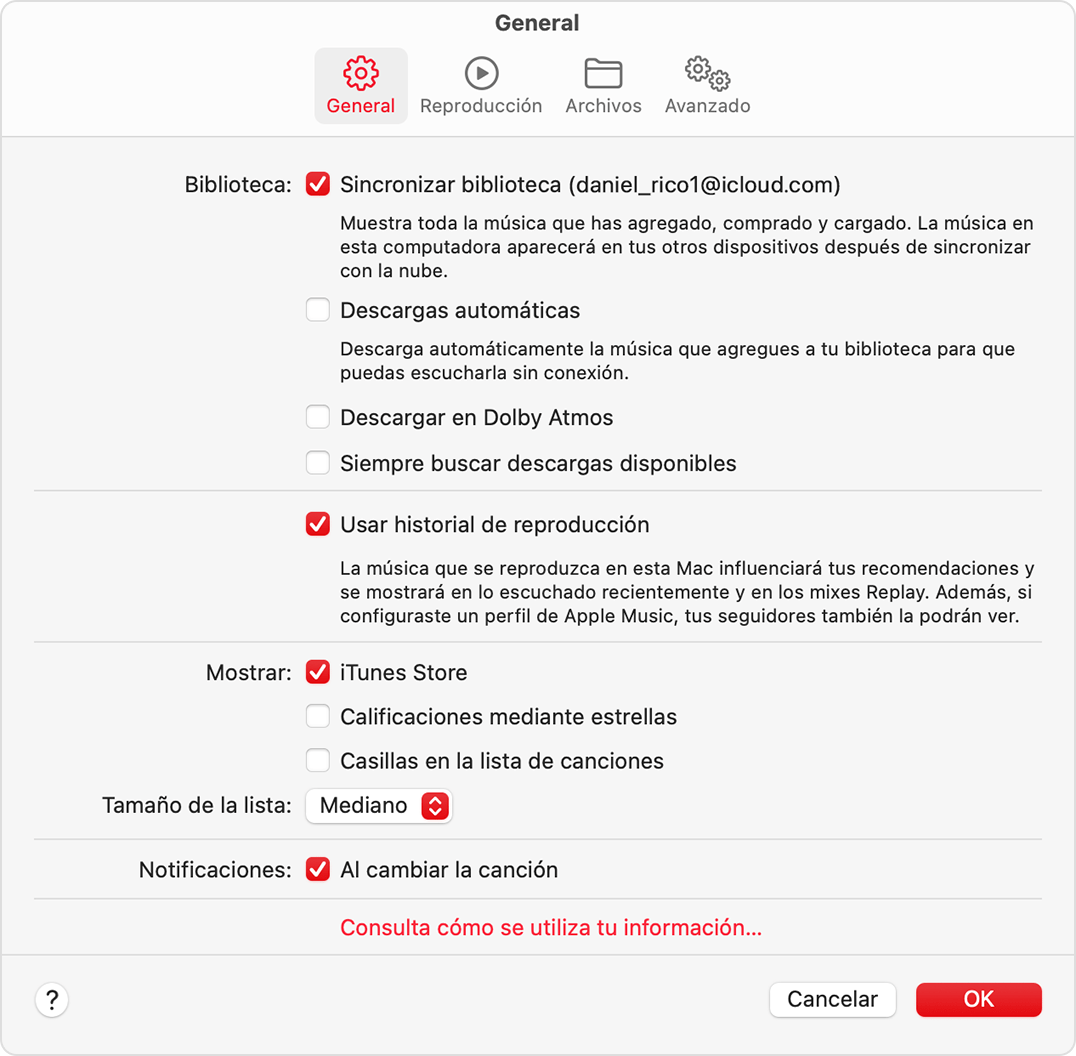 La pestaña General en la configuración de Apple Music. En la tercera sección, está activada la opción Mostrar y está seleccionada iTunes Store.