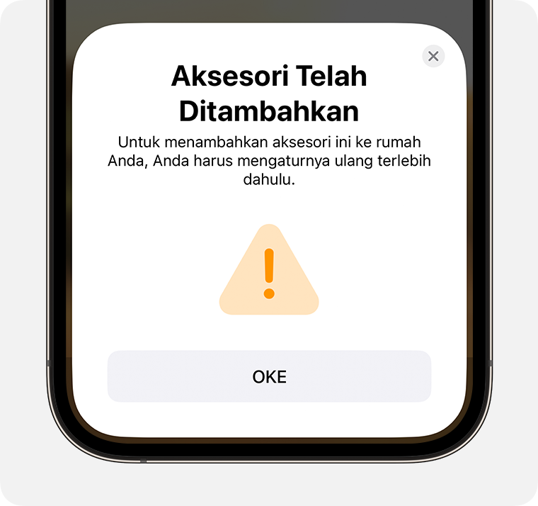 Pesan Aksesori Telah Ditambahkan yang berisi petunjuk “Untuk menambahkan aksesori ini ke rumah Anda, atur ulang aksesori terlebih dahulu” akan muncul di iPhone