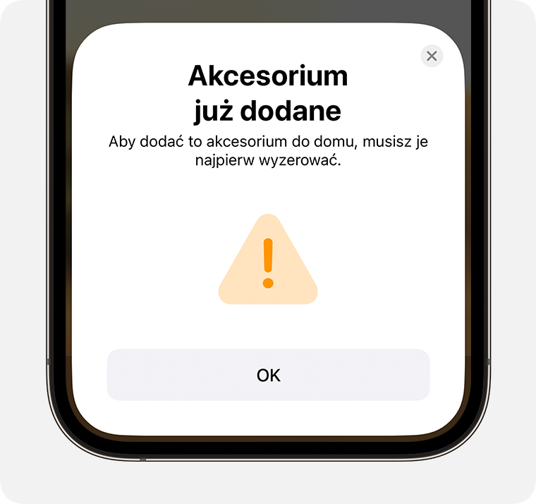 Komunikat Akcesorium już dodane, zawierający instrukcje „Aby dodać to akcesorium do domu, musisz je najpierw zresetować” na iPhonie