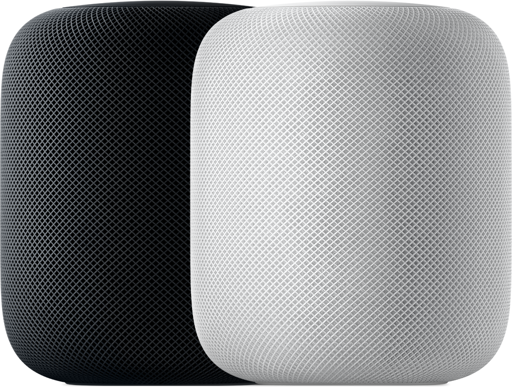 Un HomePod de color gris espacial y un HomePod de color blanco (1.ª generación) colocados uno al lado del otro.