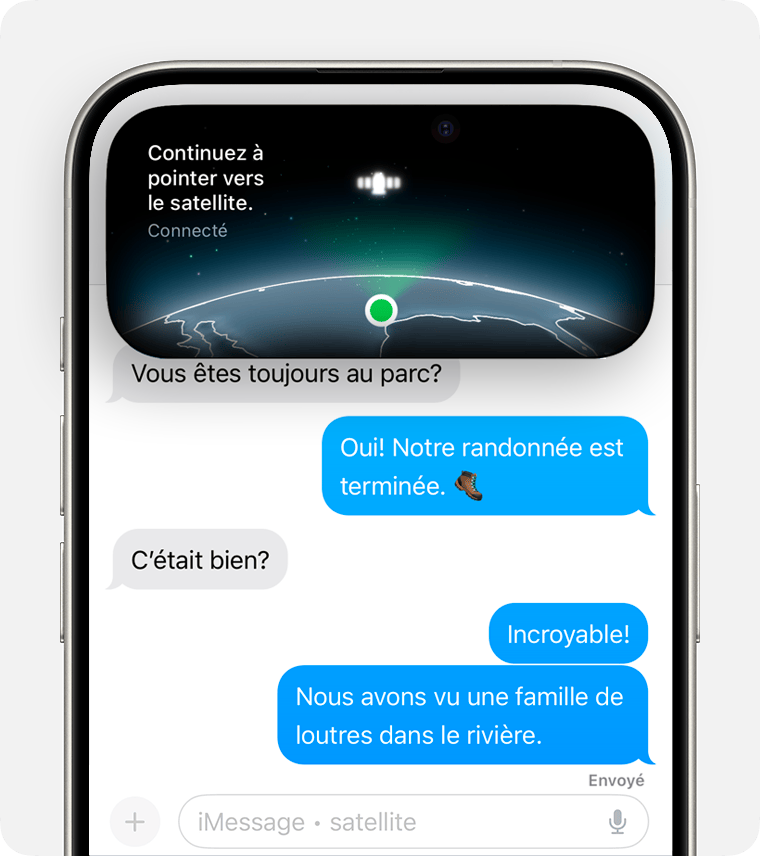 Envoi d’un SMS par satellite dans l’app Messages. Dynamic Island indique une connexion par satellite avec un signal fort.