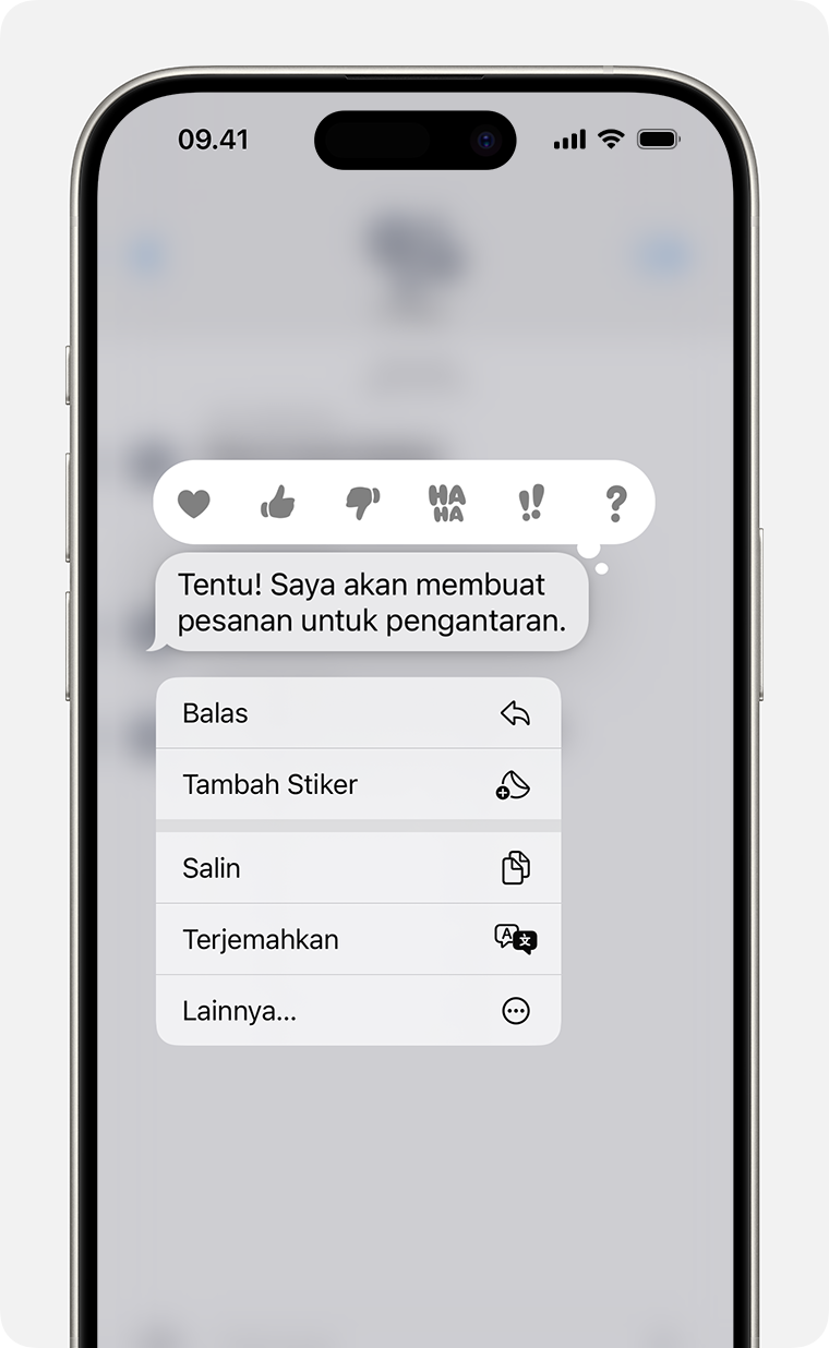 iPhone menampilkan menu balasan spesifik setelah Anda menyentuh dan menahan gelembung pesan untuk mengirim balasan spesifik