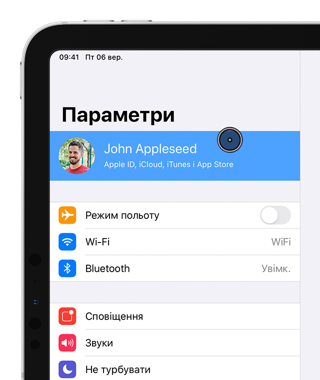 Екран параметрів iPad з указівним пристроєм, який вибирає обліковий запис John Appleseed.