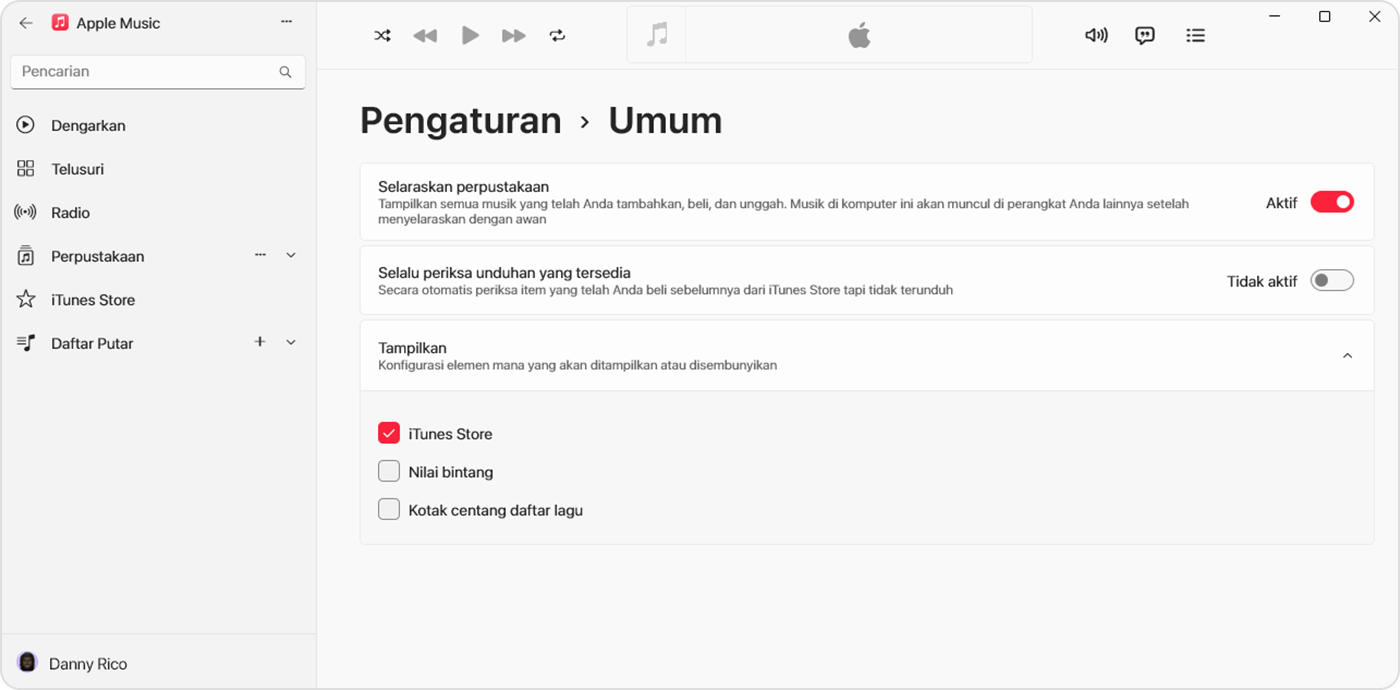 App Apple Music untuk Windows menampilkan Selaraskan Perpustakaan yang dinyalakan di Pengaturan > Umum 