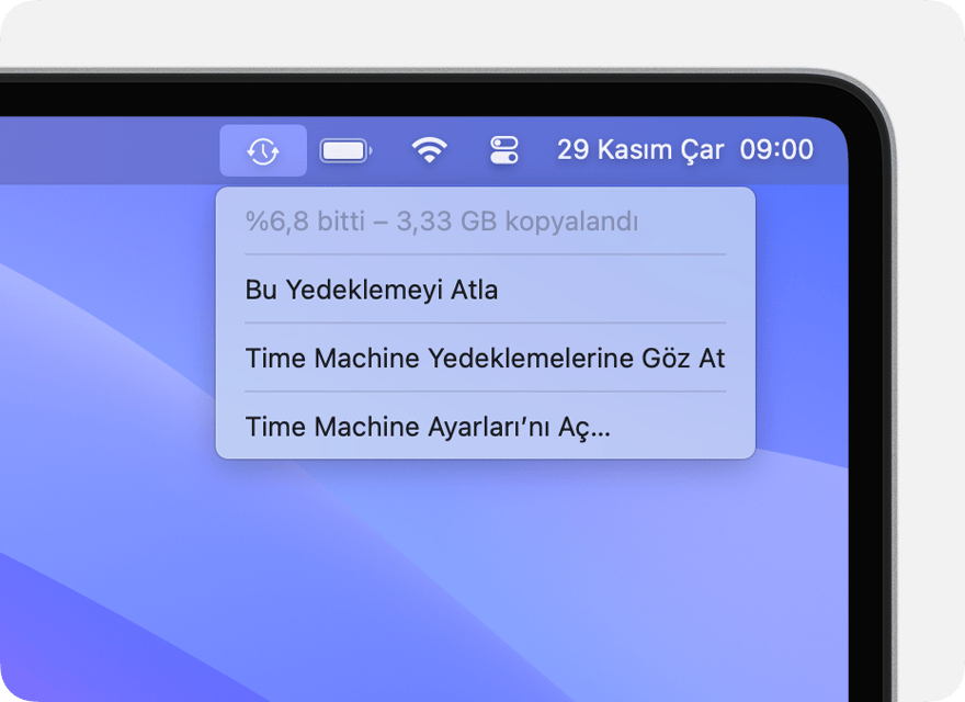 Devam etmekte olan bir yedeklemeyi gösteren Time Machine menüsü