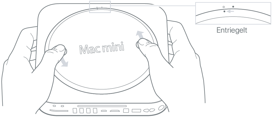 Zwei Hände drehen die untere Abdeckung des Mac mini.