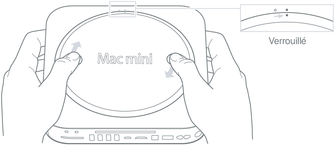 Un Mac mini vu du dessous, avec le couvercle inférieur en position verrouillée