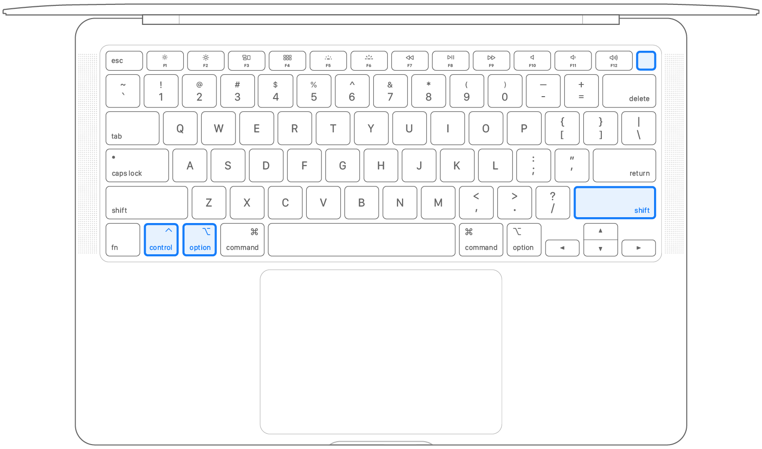 Vista superior del teclado de una computadora portátil con las cuatro teclas resaltadas