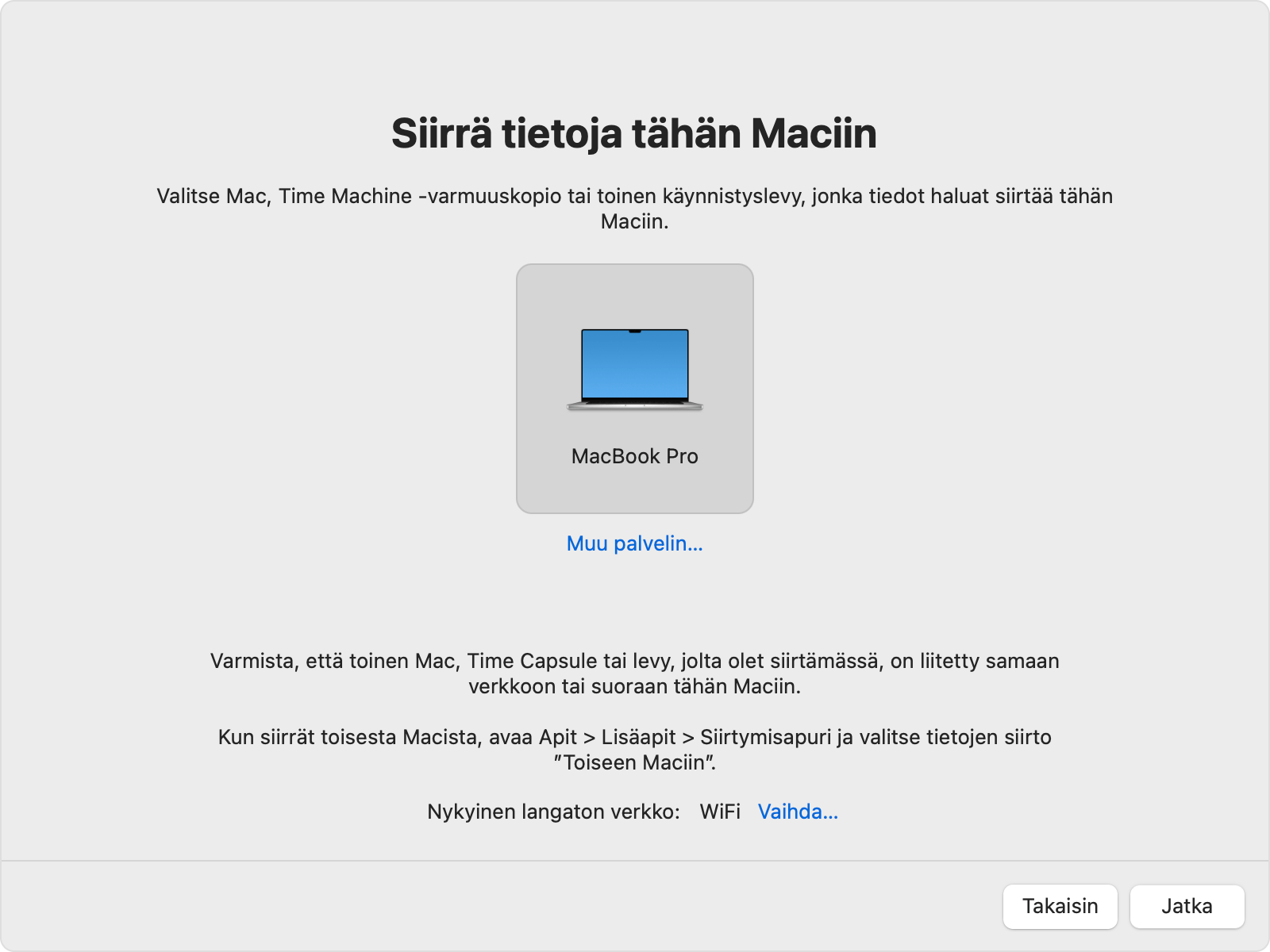 Siirtymisapuri, jossa näkyy valittuna vanhan Macin kuvake.