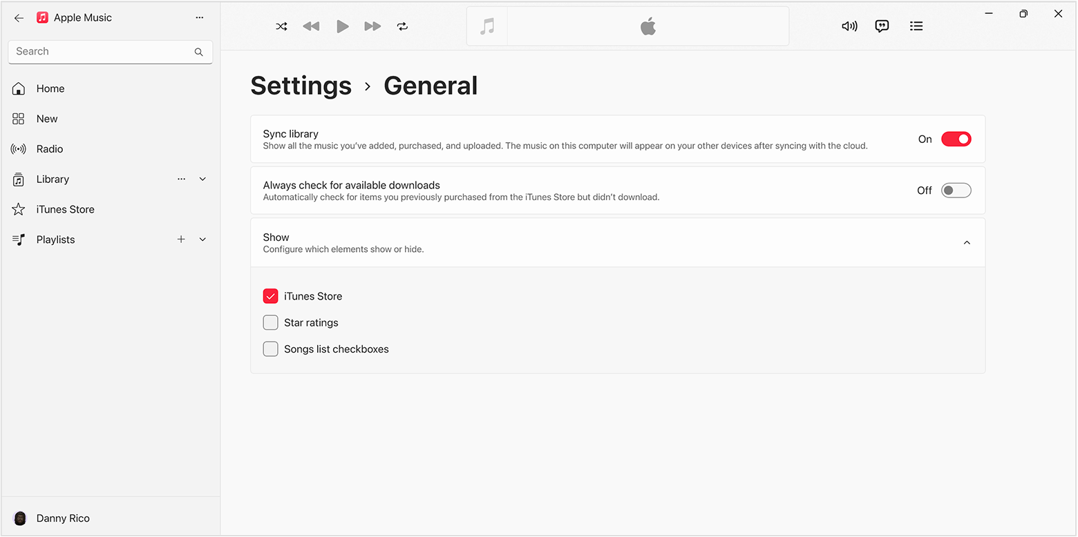 The Genneral Settings of the Apple Music app for Windows. The iTunes Store is selected.