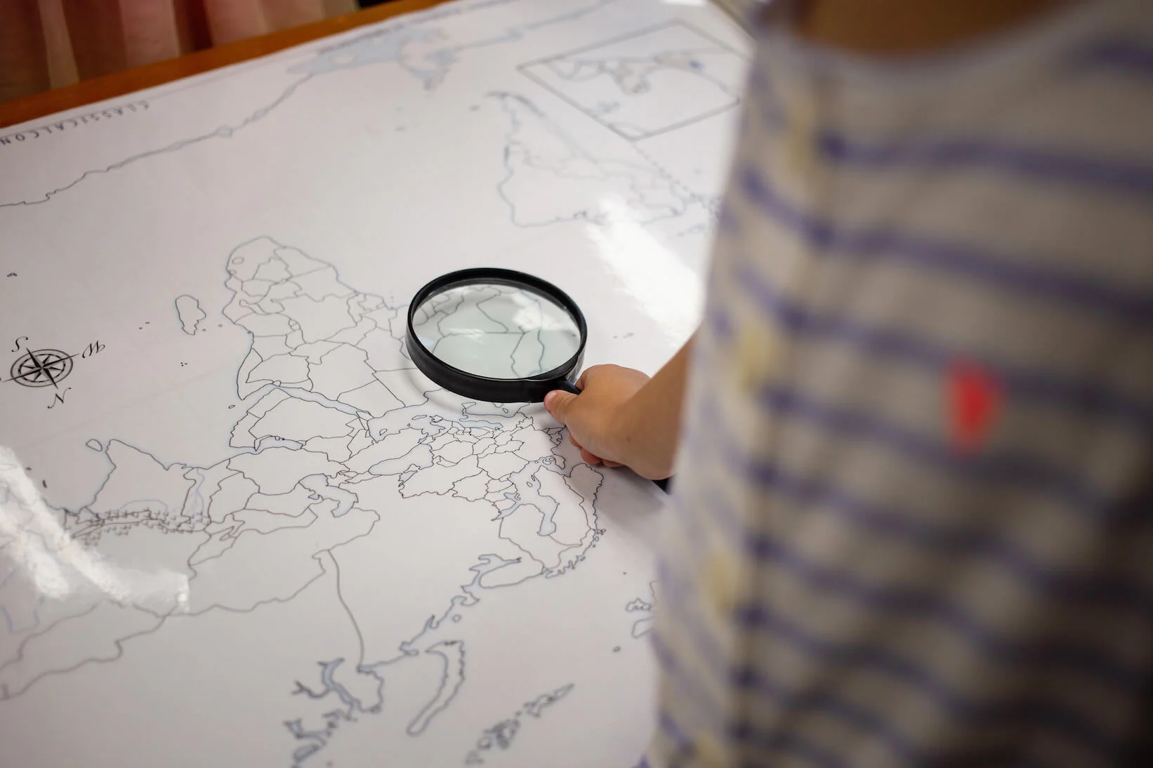 Child looking at a map.