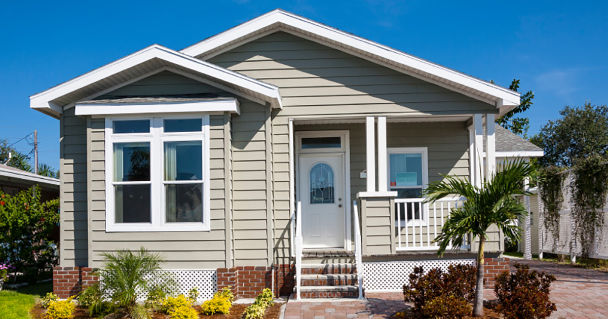 Front of a house on a sunny day.