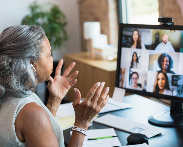 Woman sitting in front of computer