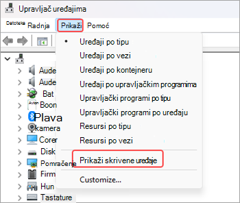 Snimak ekrana prozora Upravljač uređajima sa opcijom "Prikaz" izabranom sa trake menija i opcijom "Prikaži skrivene uređaje" istaknutom crvenom bojom.