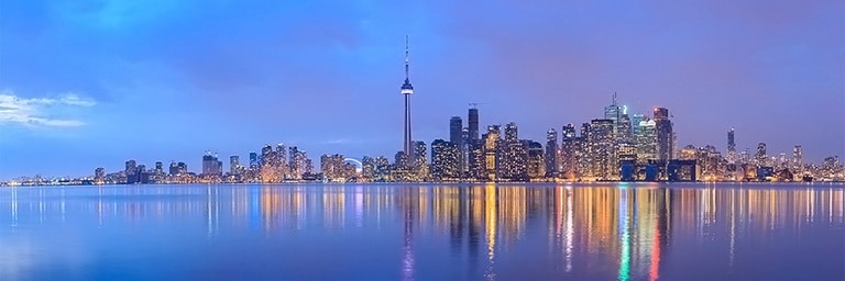 cityscape view of Toronto skyline at dusk