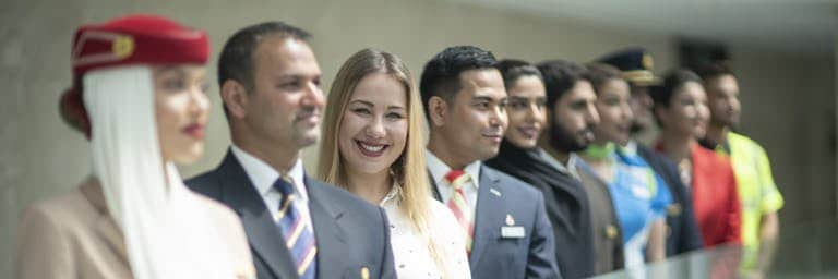 diverse group of Emirates employees standing together