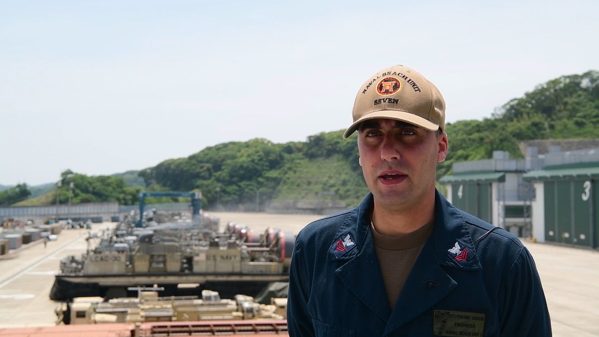 Interview with Hull Maintenance Technician 1st Class Jonathon Gordon, a Landing Craft Air Cushion (LCAC) engineer assigned to Naval Beach Unit 7. NBU-7 functions as a Forward Deployed Naval Force (FDNF) command responsible for executing the manning, organizing, training, maintaining, and equipping of all Naval Beach Group ONE assets deployed or forward assigned in support of FDNF missions. (U.S. Navy video by Petty Officer Third Class Gabriel Fields)