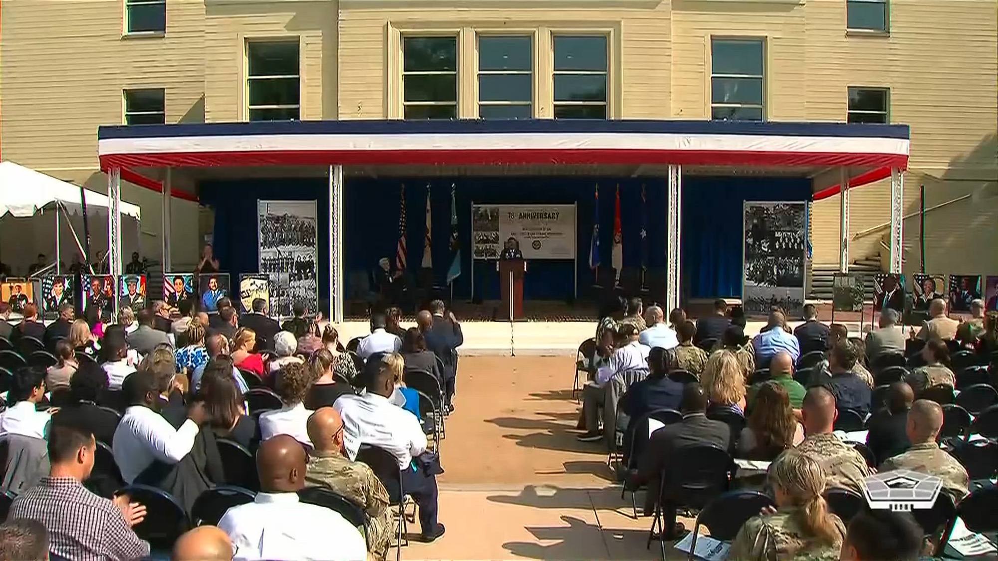 Deputy Defense Secretary Kathleen H. Hicks and Gilbert R. Cisneros Jr., undersecretary of defense for personnel and readiness, speak at a ceremony marking the 75th anniversary of the integration of the federal workforce and the U.S. armed forces. President Harry S. Truman signed the landmark civil rights executive orders on July 26, 1948.   