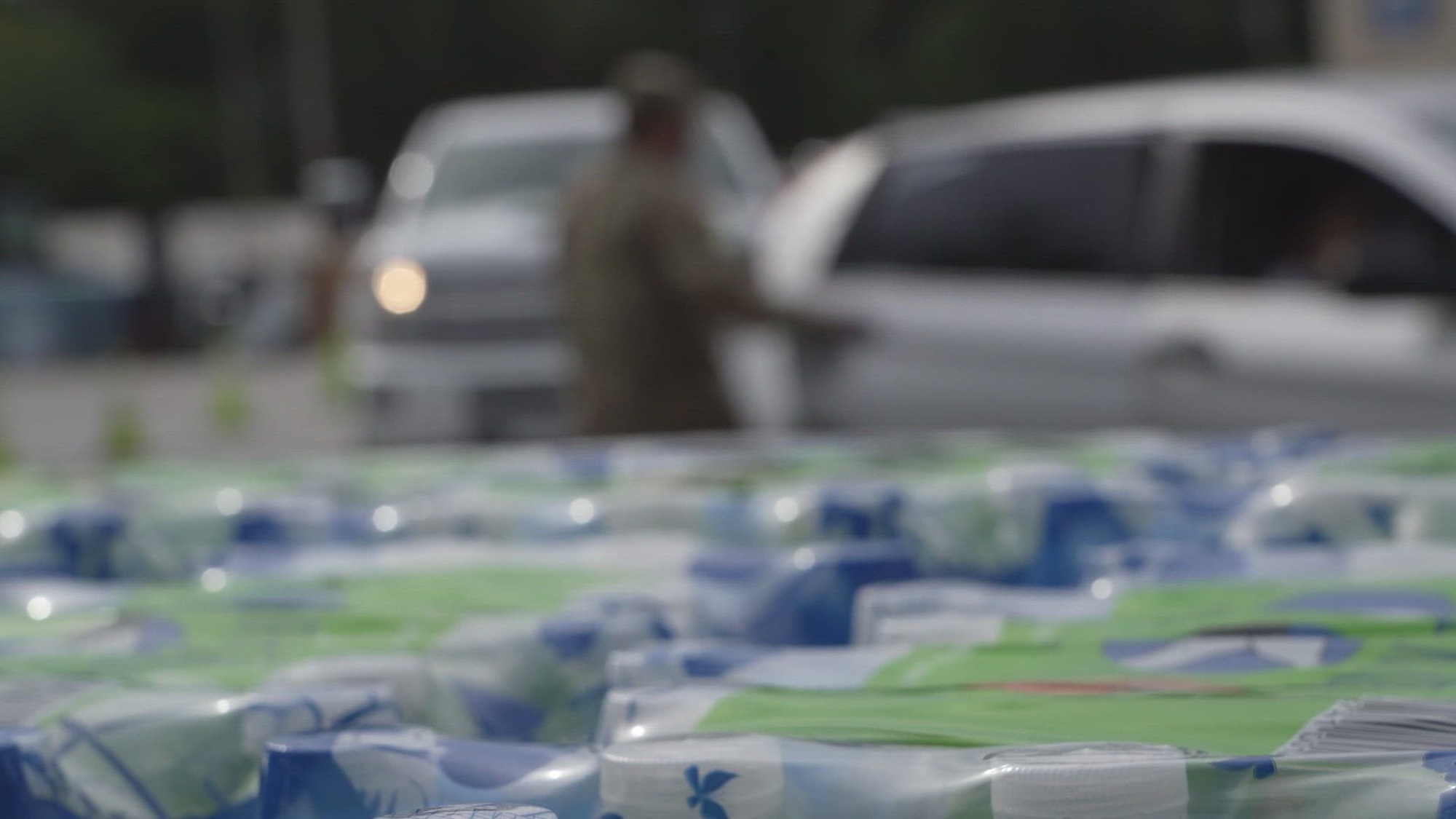 Members of the South Carolina National Guard help pass out water and meals to people impacted by Hurricane Helene.