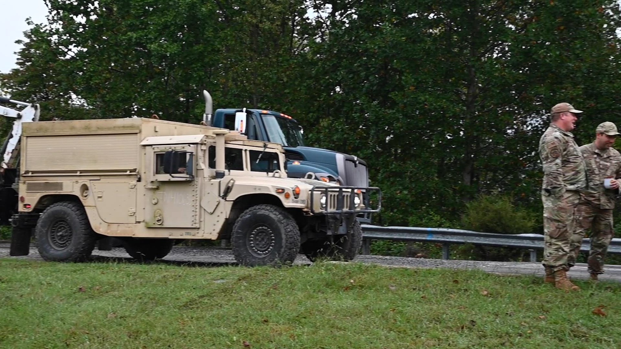 Tennessee Air National Guard members from the 118th Wing and 134th Air Refueling Wing's civil engineering squadrons remove debris from Hampton, Tennessee Oct. 2, 2024. The Tennessee Air National Guard CES members were activated to assist with the recovery efforts after Hurricane Helene hit East Tennessee. (U.S. Air National Guard video by Senior Airmen Xaviera Stevens.)