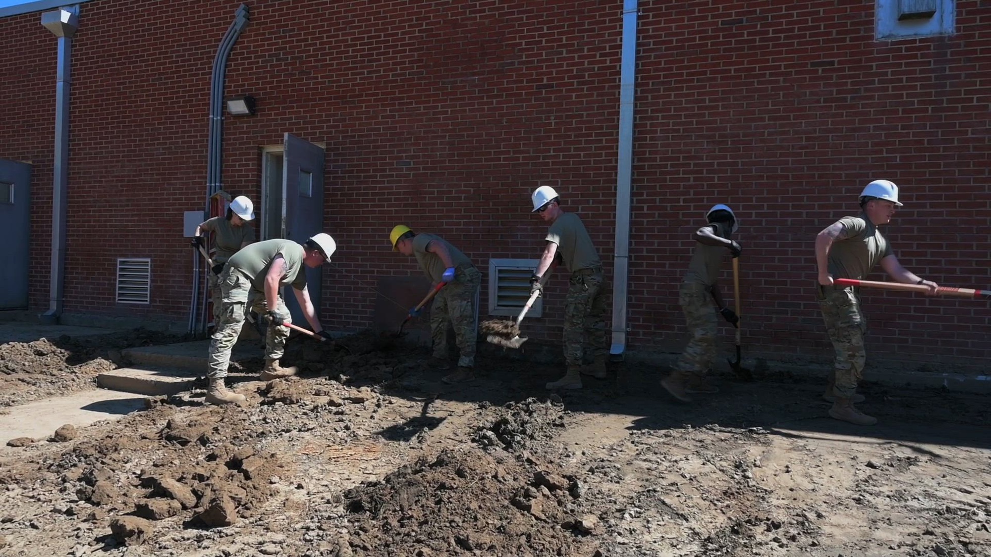 Tennessee National Guardsmen cleared over 20 tons of debris and sediment from an Erwin, Tennessee water treatment facility on October 11, 2024. In response to historic flooding from Hurricane Helene, both Airmen and Soldiers are commuting to surrounding areas daily to help clear debris and give assistance to local residents.