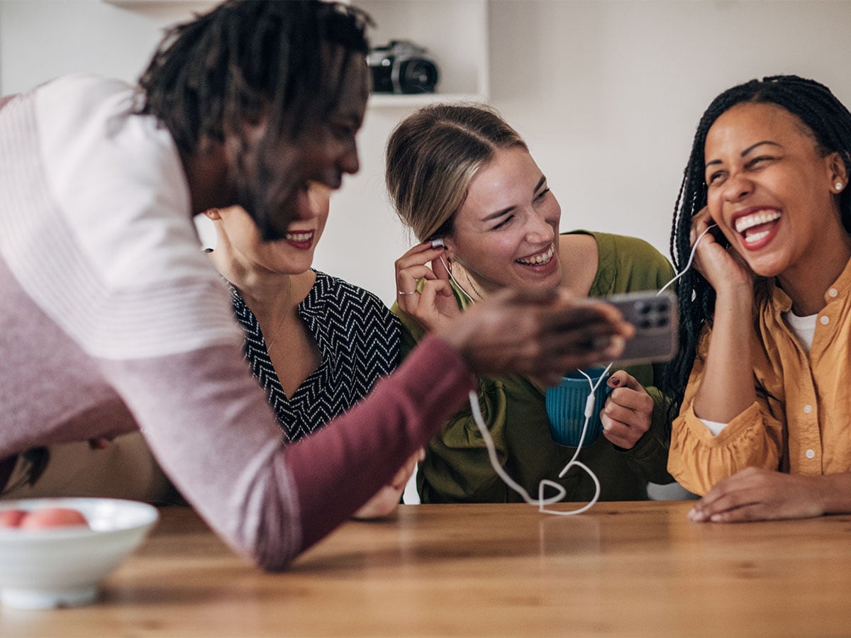 Women listening to music on a phone