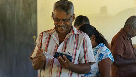 Photo of an elder who is enjoying his new Spectacles