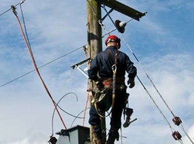 Electrical lineman working