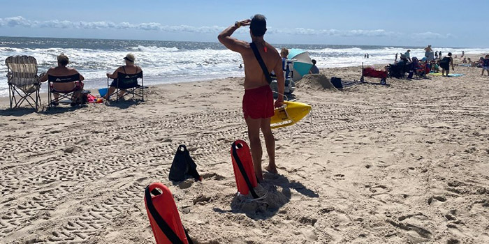 Lifeguard patrolling the beach