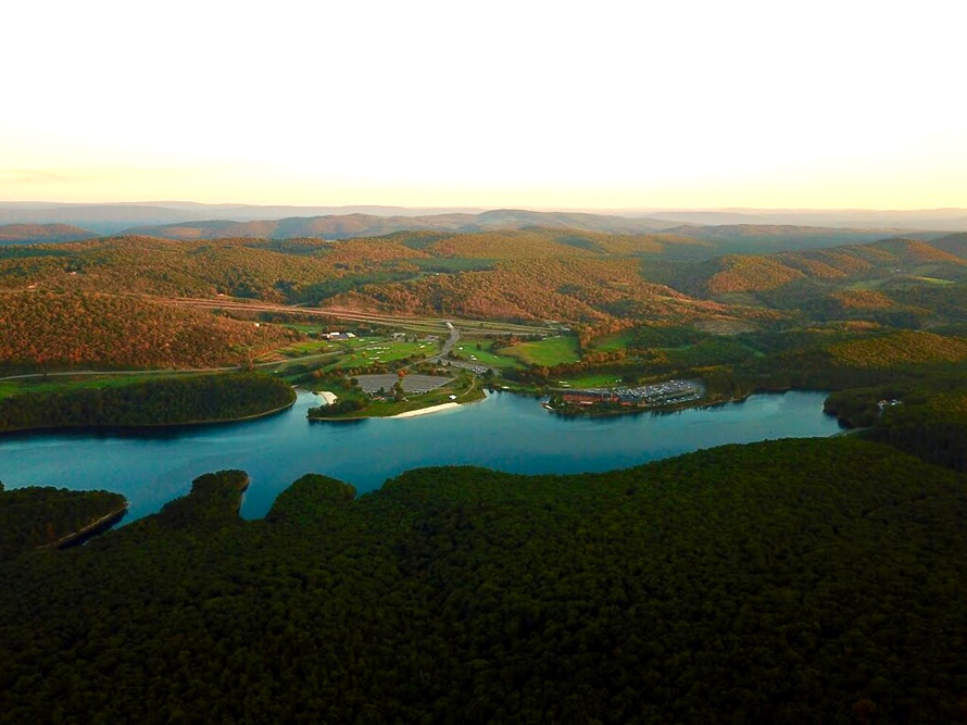 Air view of the entire park, lake, beach, forest and resort