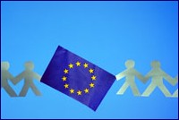 Paper cutted characters holding by the hands with a European flag amongst them