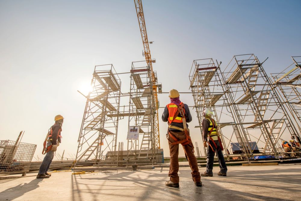 construction workers at dusk