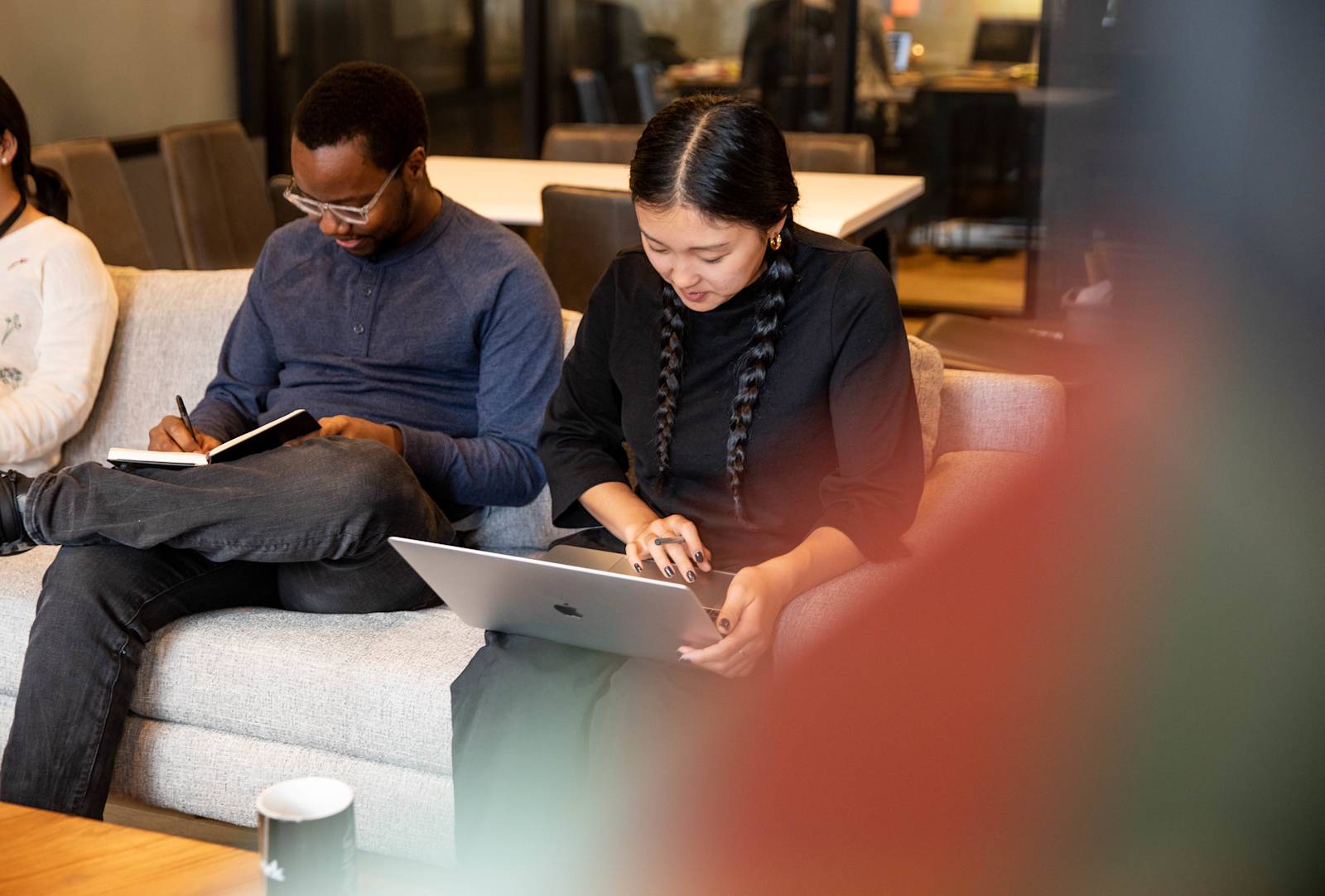 [KB] Two people working in an office.