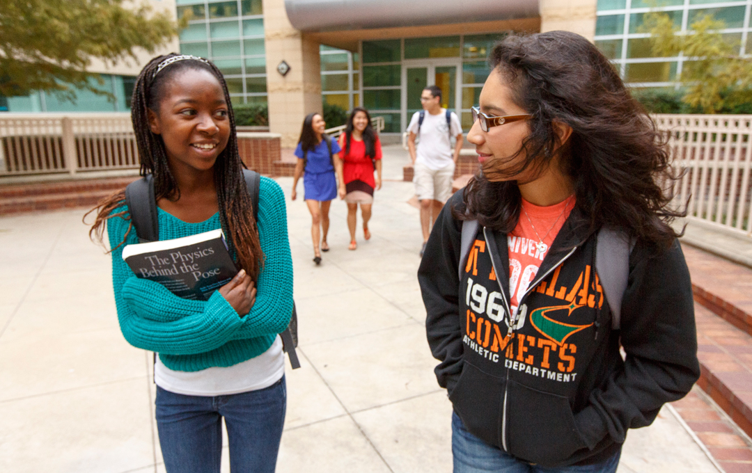 students talking to each other