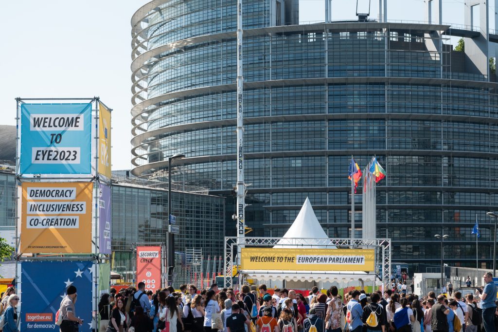 European Youth Event 2023 Overview of the event entrace showing banners of the event and the parliament