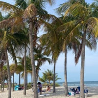 Photo taken at Crandon Park Beach by Suzy R. on 4/29/2023